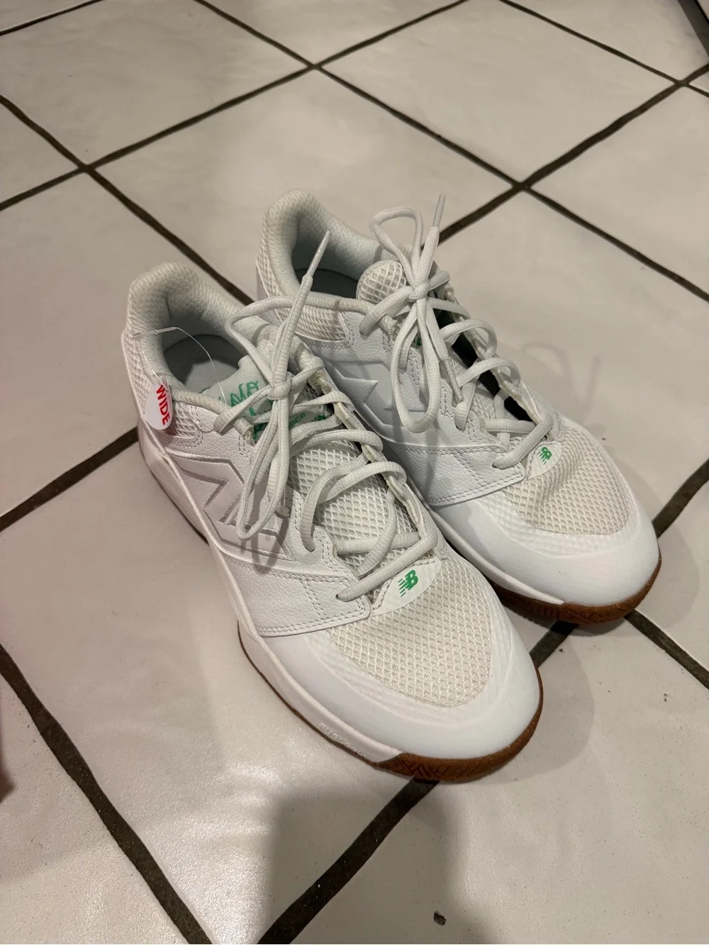 New Balance White Athletic Sneakers with Green Accents and Gum Outsole